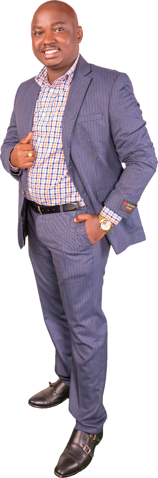 Ngash, incoming MP 2027, smiling in a blue suit